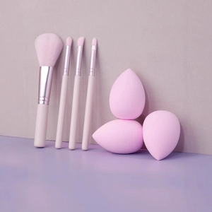 Pink makeup brush set with 4 professional brushes and 3 blending sponges for makeup beginners