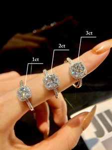Detailed comparison of 1ct, 2ct and 3ct square cut moissanite rings on a hand