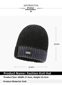 Detail view of winter knit beanie with GD label and thick ribbed texture in black and gray