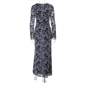 Detail showing the back view of a slim fit long sleeve dress with floral flocking pattern