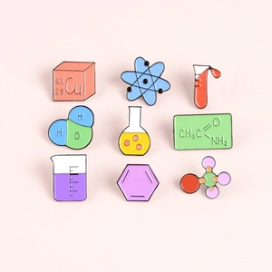 Set of 9 science-themed enamel pins featuring test tubes, atoms, and chemical formulas