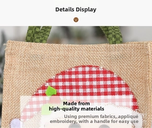 Detail of Christmas burlap gift bag featuring Santa Claus appliqué and plaid handles