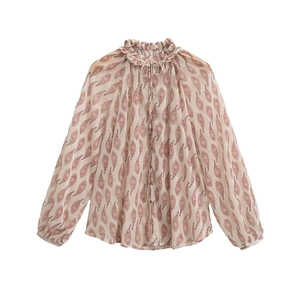 Detail of floral paisley print chiffon shirt with ruffled collar and neck ties