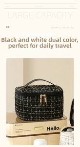 Large capacity tweed makeup bag with top handle and double zipper for travel storage