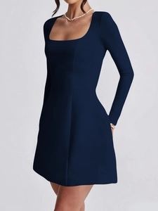 Detail view of navy blue long sleeve A-line dress with elegant square neck and smooth texture