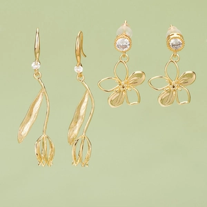 Gold-plated floral earring set featuring tulip pendants and zircon flower studs for women