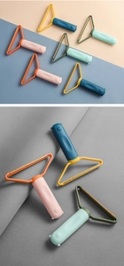 Dual-purpose pet hair remover brushes for rugs and sofas in four assorted pastel colors