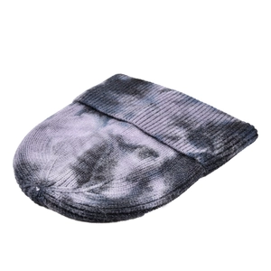 Detailed view of the purple and grey tie-dye pattern on the ribbed knitted beanie.