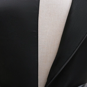 Detail of hidden back zipper and satin texture on Halloween girl witch pumpkin dress