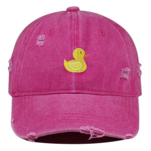 Close-up of duck embroidery and distressed holes on rose red washed cotton baseball cap