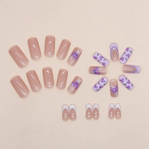 Pink and purple heart press-on nails with French tips and silver glitter accents