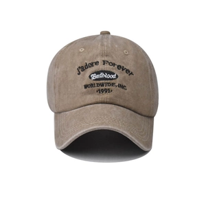 Close-up of the vintage brown washed cotton baseball cap with Badblood embroidery detail