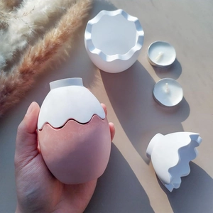 Egg-shaped resin candle holder mold for DIY crafts with a unique wavy edge design