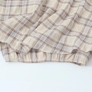 Fashion plaid short top with layered hem and elastic smocked details in beige and brown