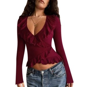 Slim fit burgundy long sleeve top with ruffle V-neck and cropped hem on white background