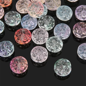 Translucent glass beads with embossed swirl patterns for DIY jewelry making in assorted colors