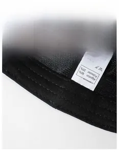 Close-up of baseball cap interior with wide sweatband and 80% cotton wash label
