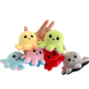 Reversible plush octopus keychain in multiple colors with golden metal rings