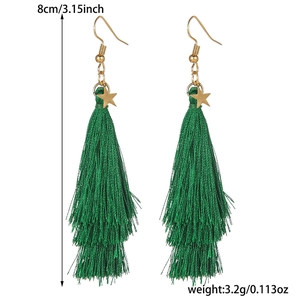 Detail view of 8cm green layered tassel earrings with gold stars and measurement labels