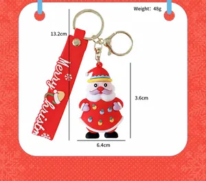 Vue détaillée d'un joli porte-clés en silicone Père Noël avec dimensions et informations