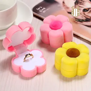 Pink and yellow sunflower shaped velvet jewelry boxes for wedding rings and necklaces