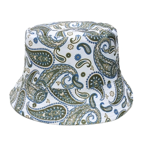 Close-up of vintage blue and green paisley patterns on a white canvas bucket hat