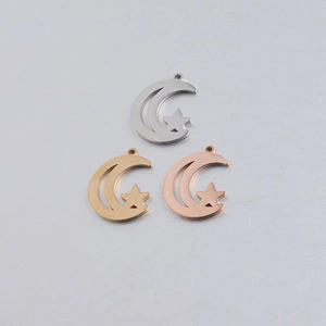 Three-color moon and star pendants in silver, gold, and rose gold polished finishes