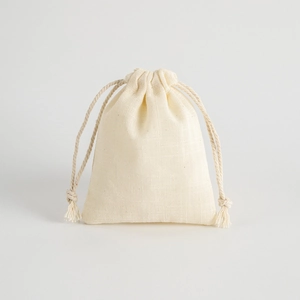 Minimalist beige drawstring cotton pouch with natural texture for jewelry storage