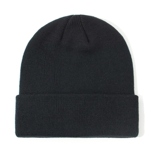 Close-up detail of a classic black ribbed knit beanie for infants and children winter wear