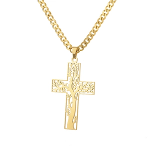 Macro shot of gold stainless steel cross pendant featuring tree of life cutout detail