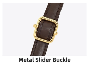 Detail of dark brown leather shoulder strap with polished gold metal hardware buckle
