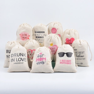 Detailed macro shot of cotton linen drawstring party favors and hangover kit bags