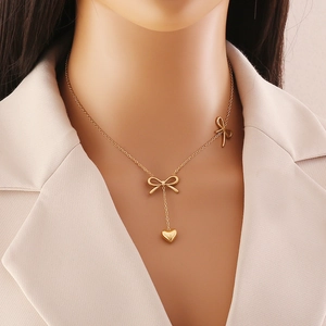Elegant gold butterfly necklace with pearl tassel heart pendant for women