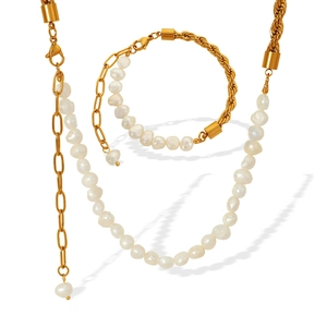 Elegant gold twisted chain and white pearl jewelry set with necklace and bracelet