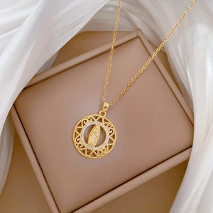 Golden titanium steel necklace with a crystal-encrusted Virgin Mary pendant on silk