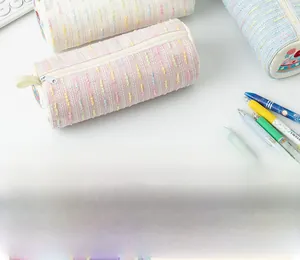 Detailed view of large capacity woven stationery bags with metal zippers and fabric loops