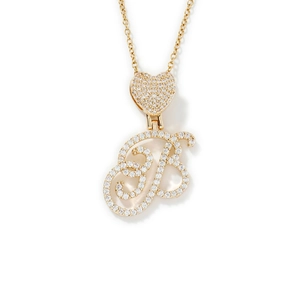 Gold cursive letter B necklace with heart bail and sparkling white cubic zirconia