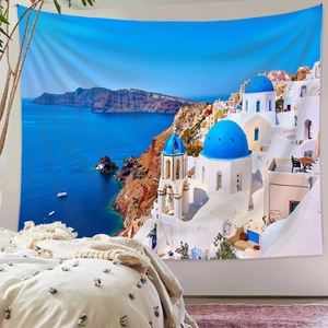 Detailed view of Santorini landscape tapestry hanging on a bedroom wall for room decor