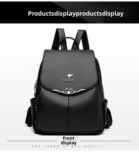 Detail view of black pebble leather backpack with silver heart buckle and flap closure