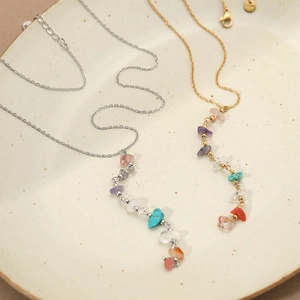 Bohemian stainless steel Y-shaped necklace with colorful natural stone beads on a tray