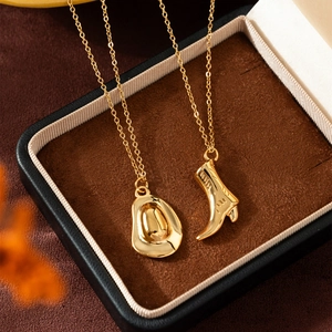18K gold plated stainless steel necklace featuring western cowboy hat and boot pendants