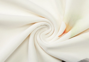 Detail shot of breathable off-white mesh fabric with colorful printed pattern accents