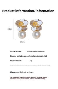 Detail of flower earrings with zircons, pearls, and silver pins, size 2.3cm x 1.6cm