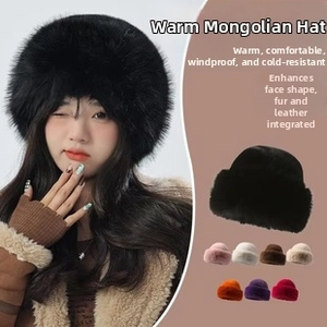 Detail of warm faux fur mongolian style hat with ear protection and plush thick texture