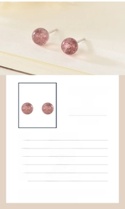 Close-up of S925 sterling silver 6mm pink strawberry crystal round stud earrings