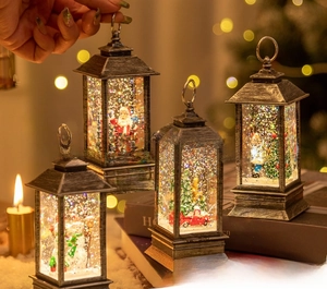 Macro detail of vintage Christmas snow globe lantern with Santa and glitter swirl