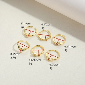 Set of 6 gold adjustable rings featuring square colorful zircons with size and weight specs