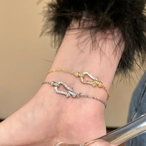 Luxury horseshoe buckle bracelet set with sparkling cubic zirconia stones for women