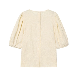 Chemisier femme jaune crème à manches bouffantes avec broderie florale texturée