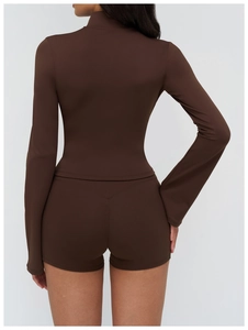 Rear view of sleek chocolate brown yoga set showing high-stretch fabric and seamless tailoring
